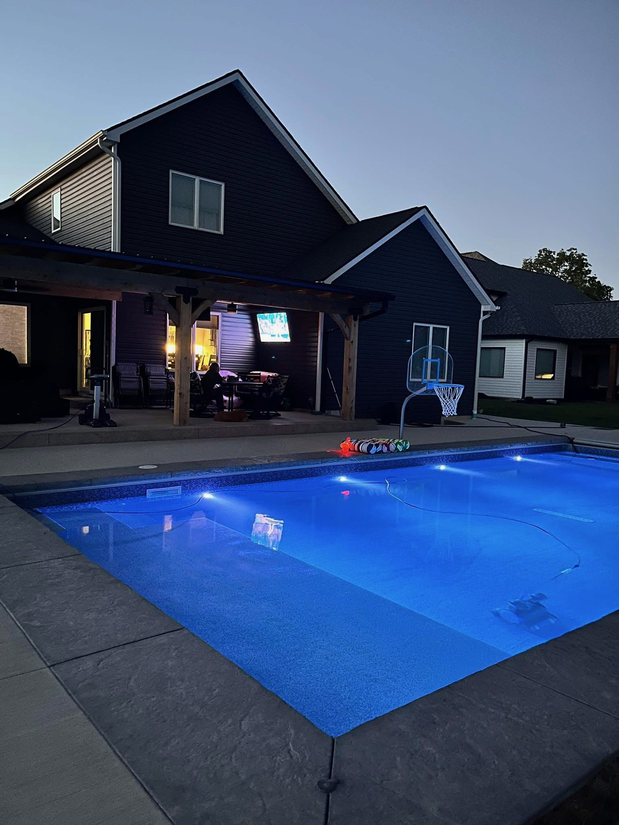 Huntertown pool illuminated at night